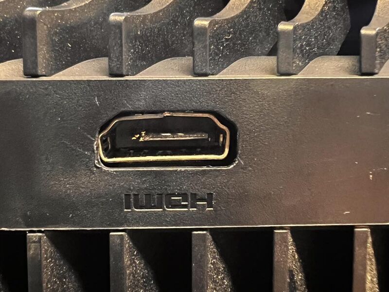 A damaged HDMI port on a PS5 main board, the fault most often sent to us by post