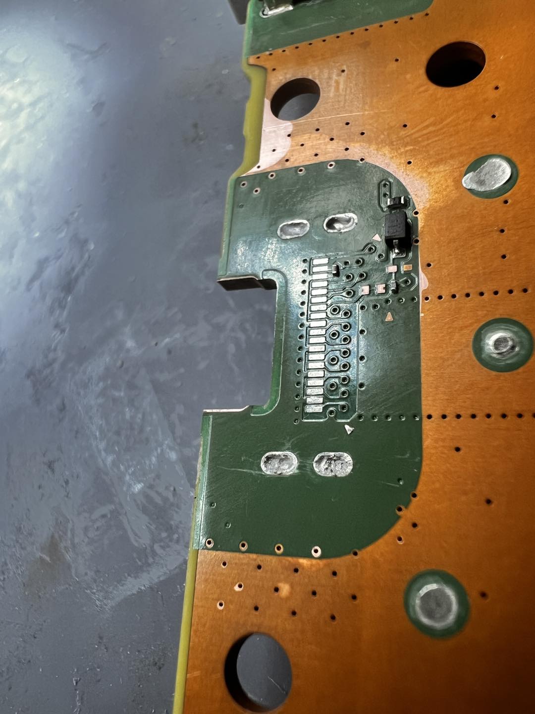 Hot-air rework station in action, removing the old HDMI port from the board