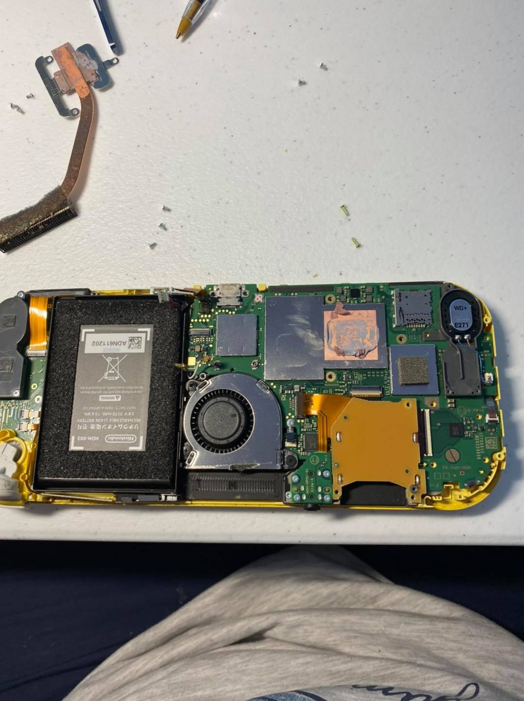 Nintendo Switch opened up on the workbench, internals visible