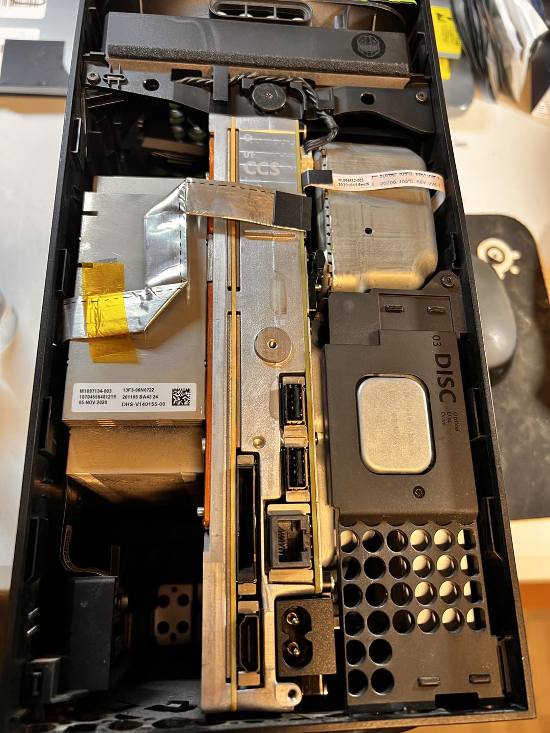 Xbox disc drive swap in progress — either drive motor or full drive assembly work